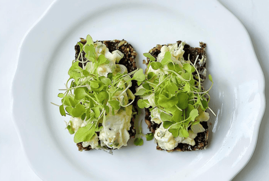 Calendula & Chive Egg Salad with Seed Bread and Arugula Greens - Bella Cucina