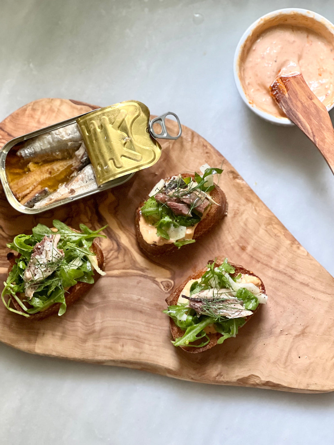 Crostini with Sweet Pepper Aioli, Fennel Salad, & Sardines - Bella Cucina