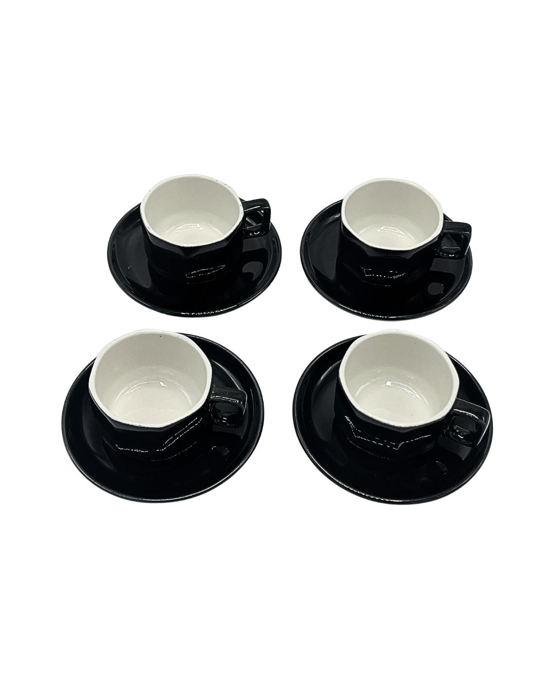 Four vintage Italian matte black ceramic espresso cups viewed from above, Bella Cucina Atlanta