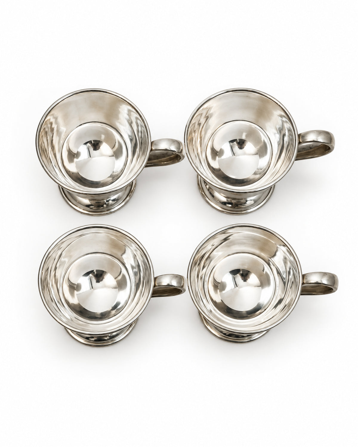 Vintage silver-tone footed cups with loop handles at Bella Cucina in Atlanta, view 3
