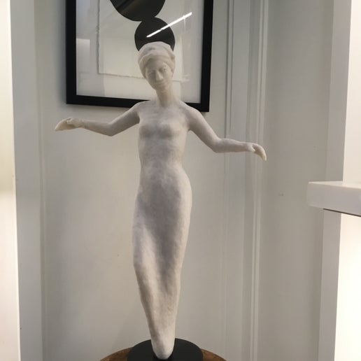 Martin Dawe Woman on Pedestal sculpture in marble composite at Bella Cucina in Atlanta