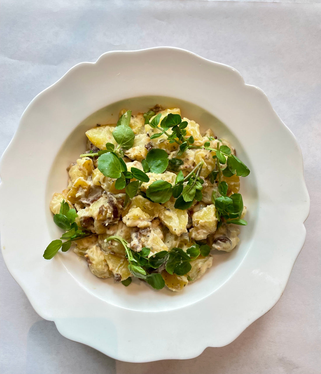 Potato Watercress Salad with Caramelized Onions & Golden Raisins - Bella Cucina