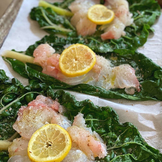 Roasted Red Snapper in Swiss Chard Leaves with Olivada Aioli - Bella Cucina