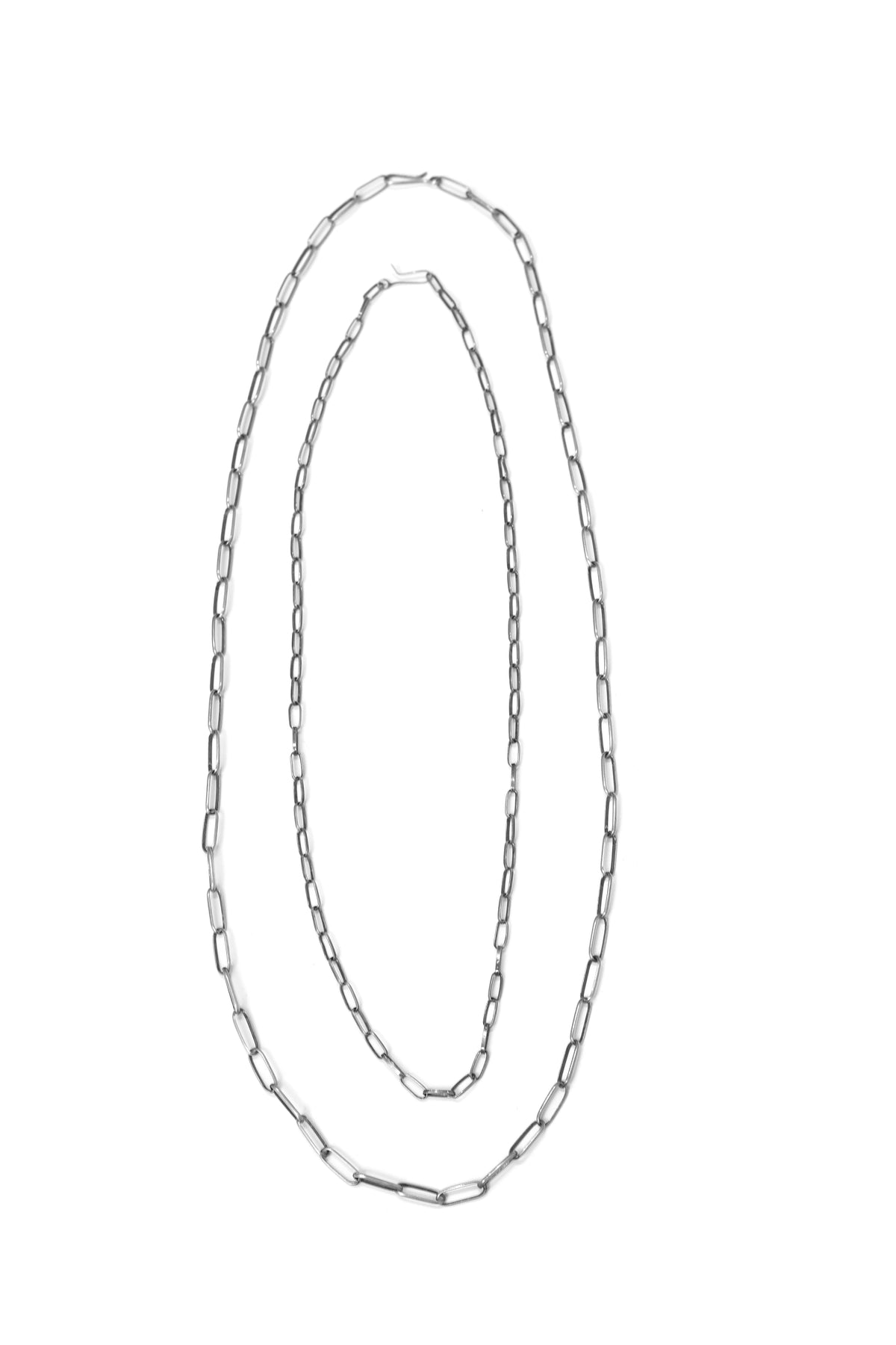 Vintage long chain necklace detail at Bella Cucina