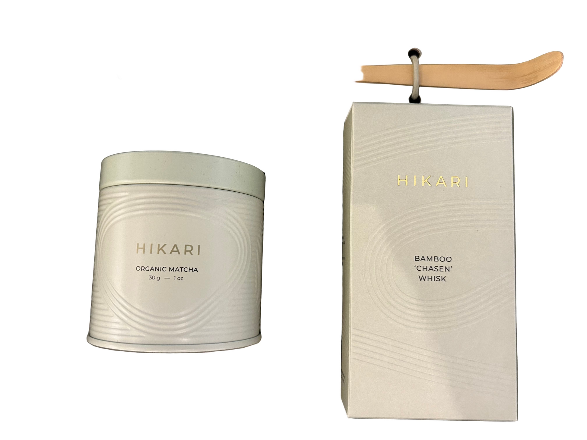 HIKARI matcha canister and packaging with a wooden tea scoop at Bella Cucina in Atlanta