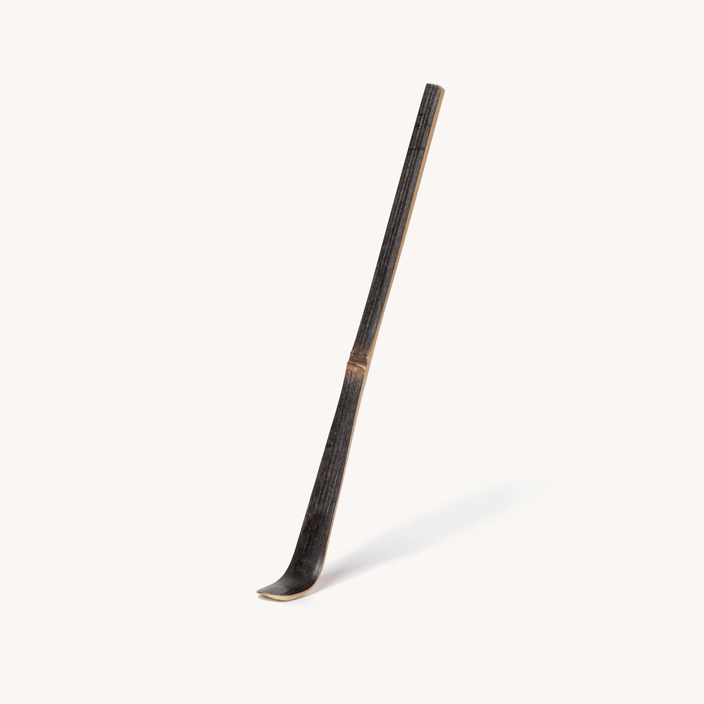 Traditional Japanese naginata sword on a white background