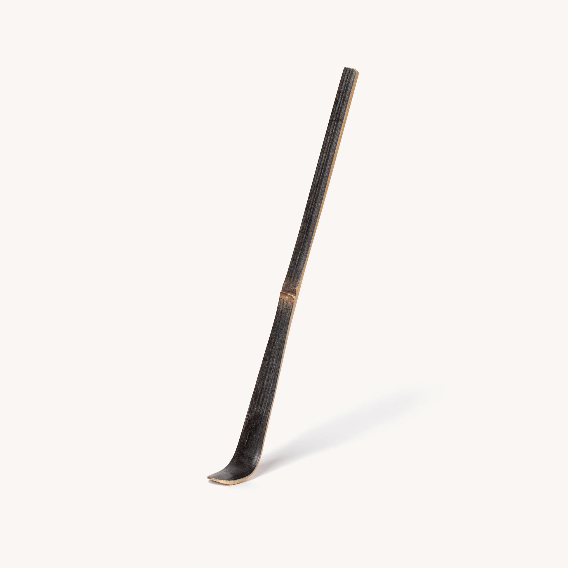 Traditional Japanese naginata sword on a white background