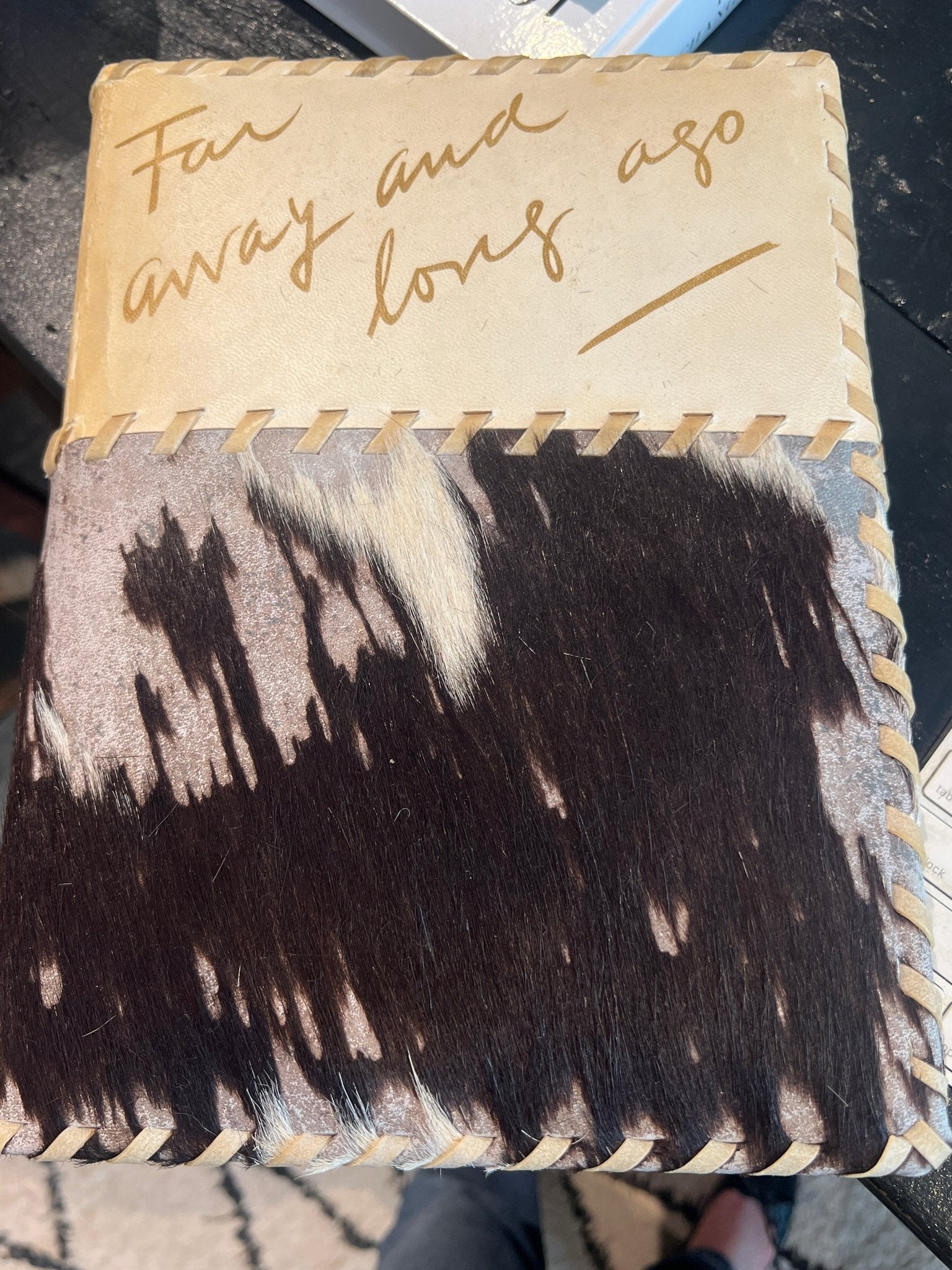 Books: Far away and long ago vintage cowhide leather Book by Bella Cucina – Books