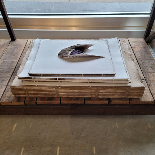 Large handmade paper bound book at Bella Cucina in Atlanta