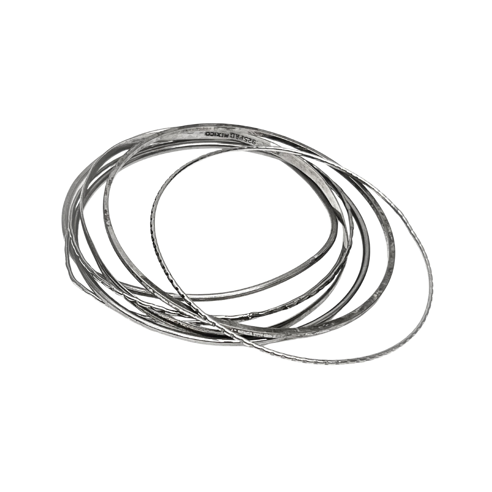 Set of silver metal wires on a white background