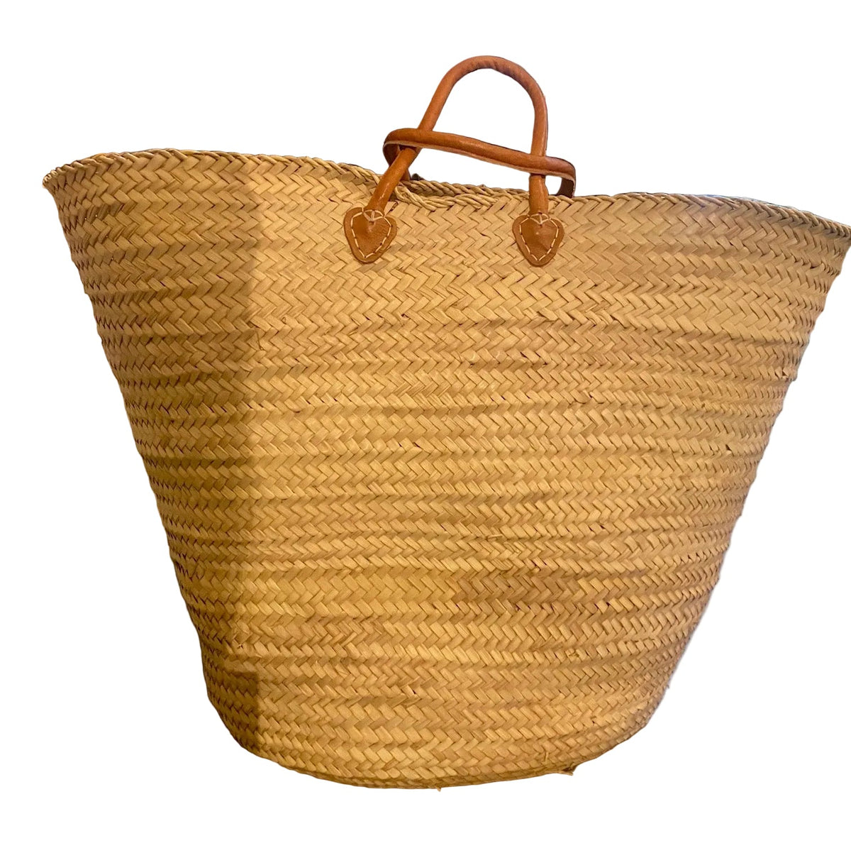 Extra large handwoven farmer's market basket with leather handles at Bella Cucina in Atlanta