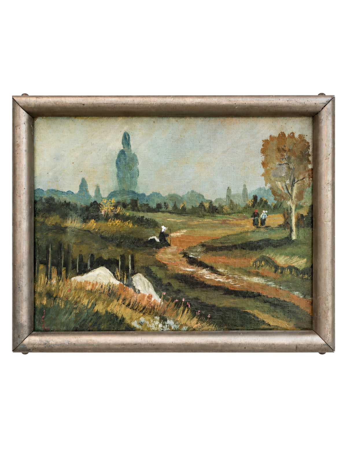 A framed landscape oil painting featuring a winding dirt path through a grassy field, with a lone tree on the right, distant stone structures, and a muted sky. The painting is housed in a distressed, rustic silver-toned metal frame.