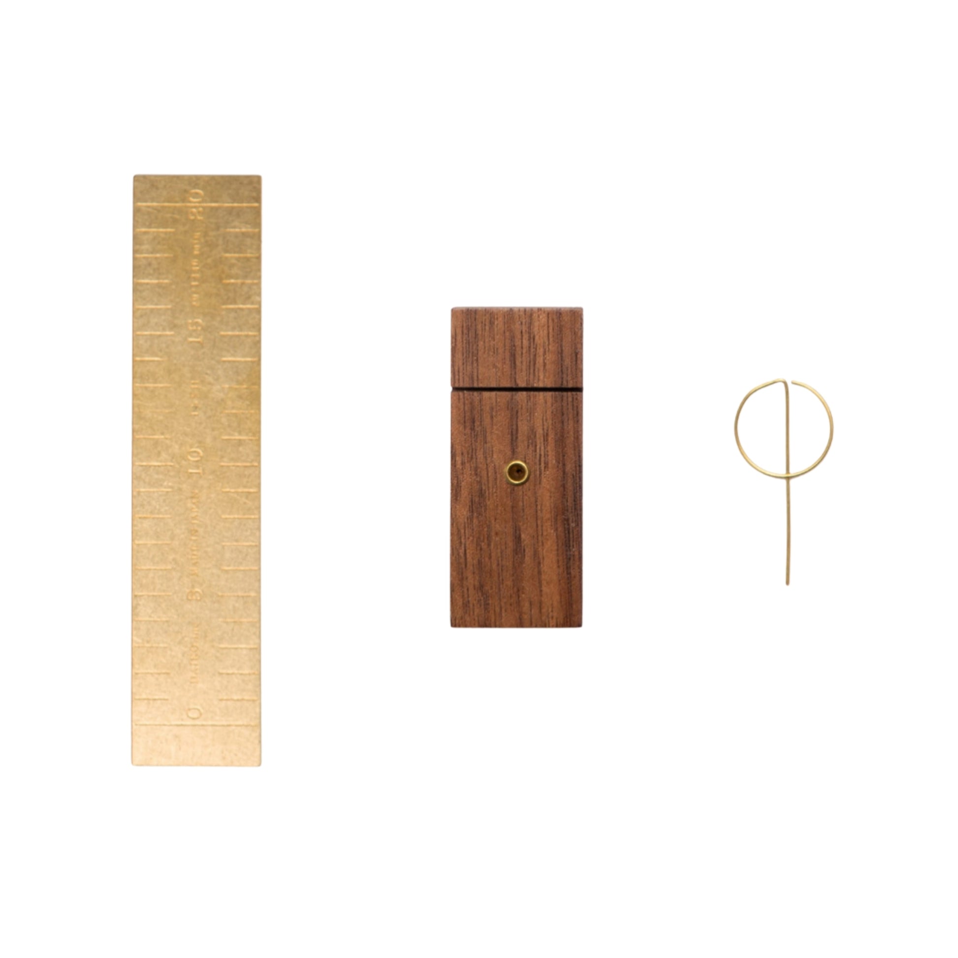 Wooden box with a gold ring and a vertical wooden panel on a white background