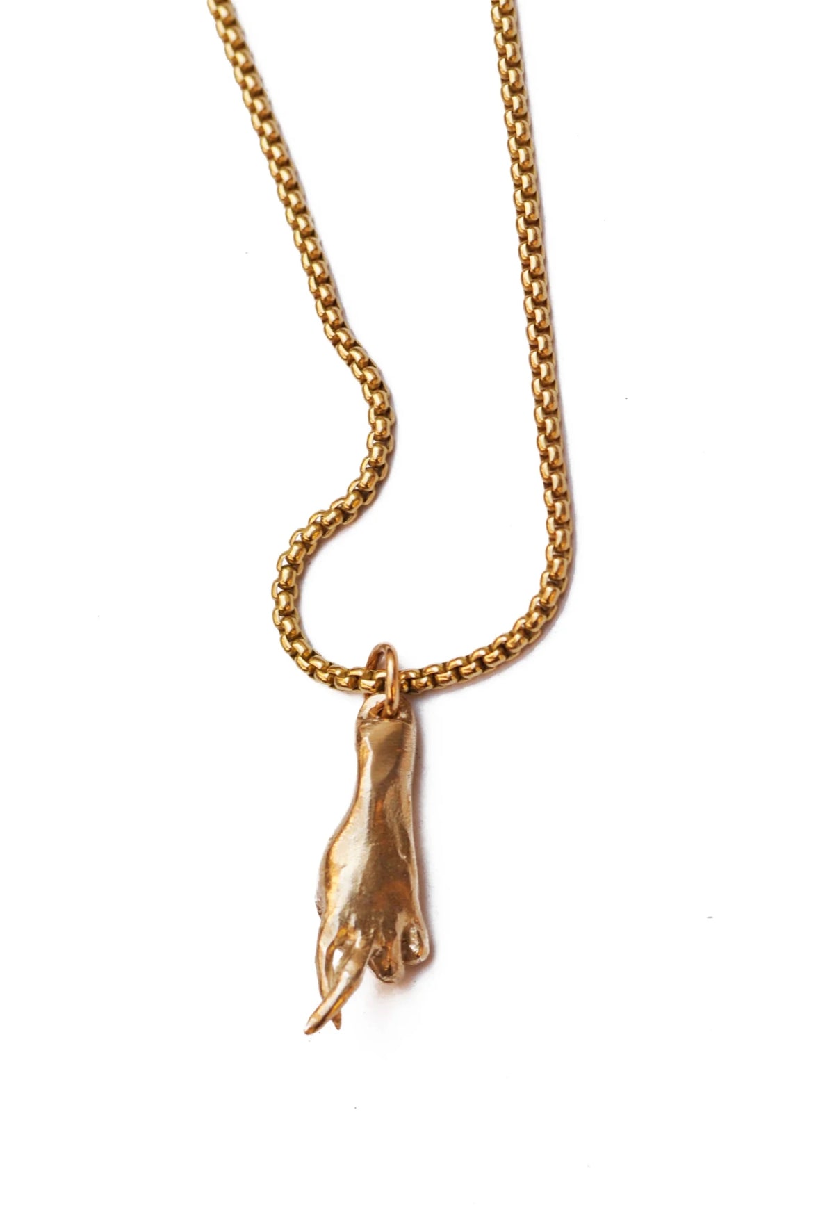 Brass gold interlocking hands necklace at Bella Cucina in Atlanta, view 4