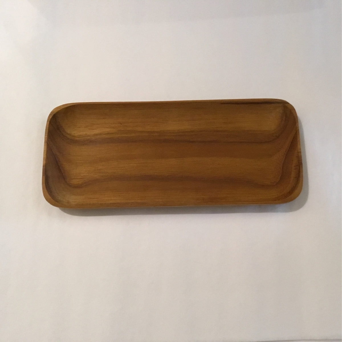 Small teak wood tray at Bella Cucina in Atlanta
