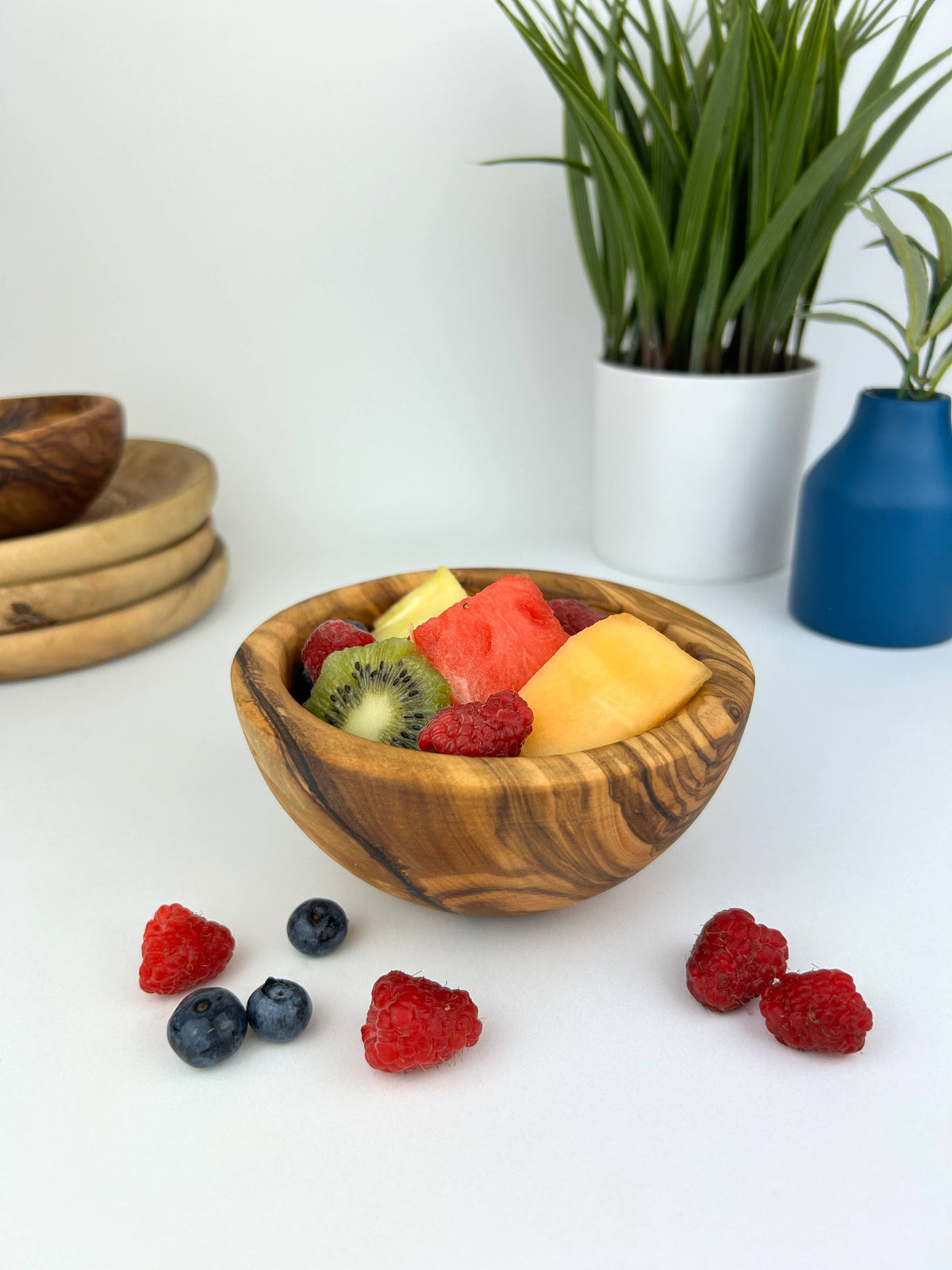 Small olive wood snack bowl at Bella Cucina in Atlanta