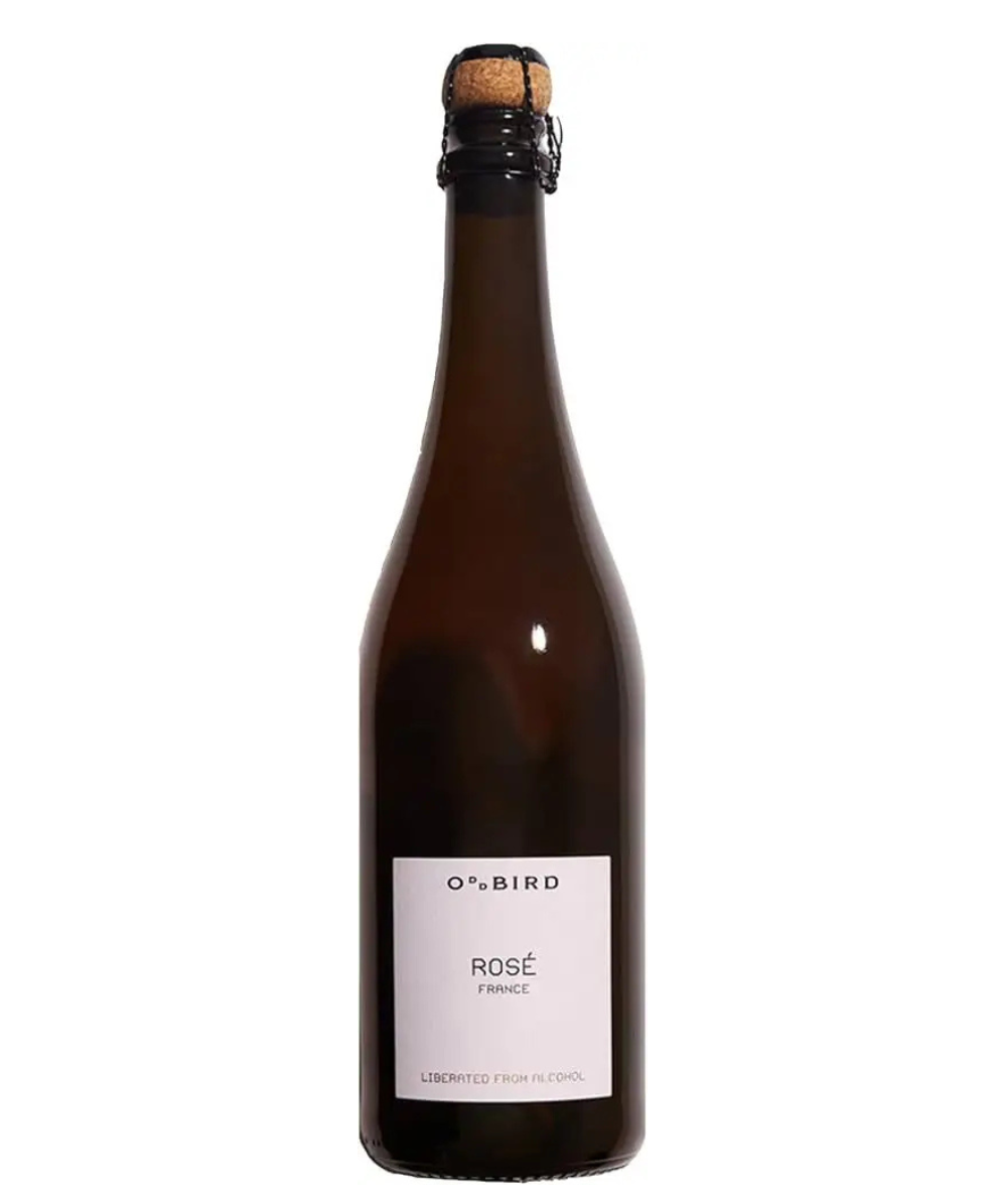 A dark brown glass bottle of O'Bird Rosé French sparkling wine with a white label and a cork-wrapped cap, isolated on a white background.