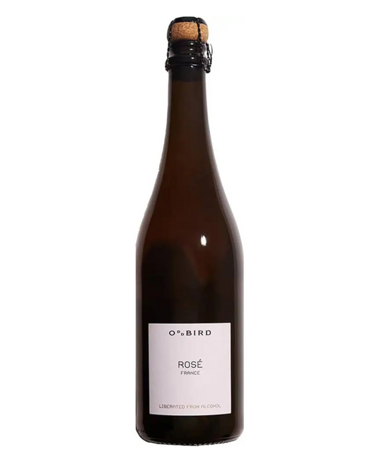 A dark brown glass bottle of O'Bird Rosé French sparkling wine with a white label and a cork-wrapped cap, isolated on a white background.