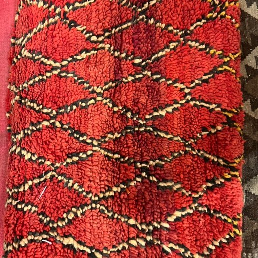 Vintage Moroccan rug in red and yellow at Bella Cucina in Atlanta