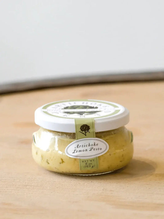 Bella Cucina Artichoke Lemon Pesto 6 ounce gourmet jar with white lid and green label